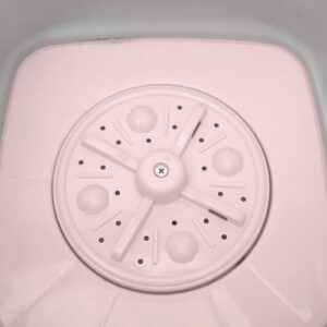 Lavatrice portatile pieghevole rosa per uso su balcone, compatta ed efficiente